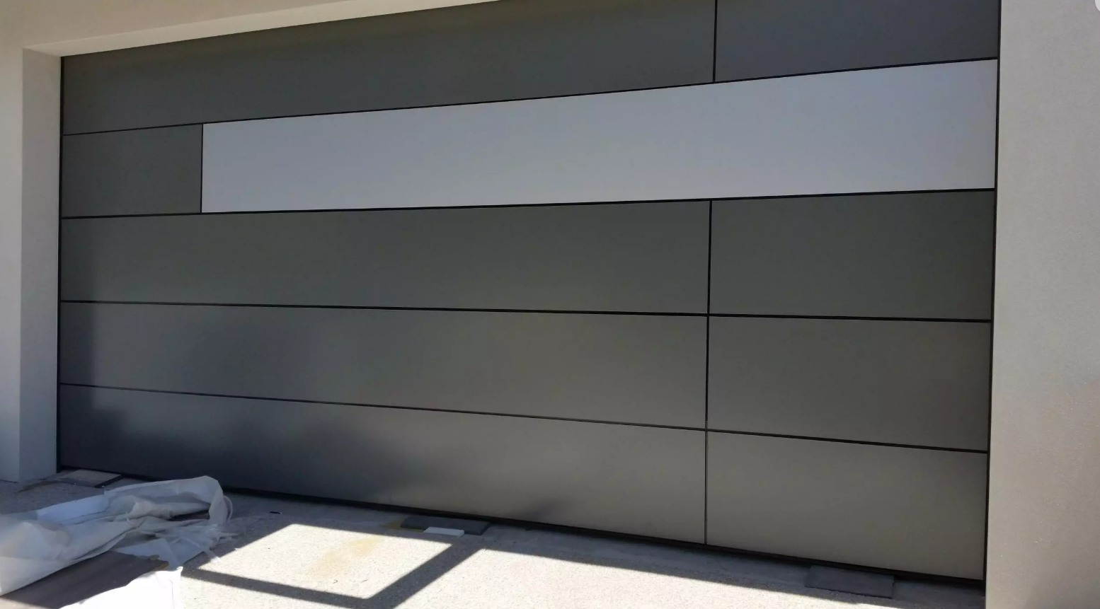 Custom garage door with sleek modern design installed by AL Garage Door Repair, featuring durable materials and premium craftsmanship