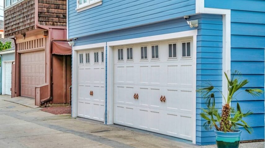 Emergency garage door repair service technician replacing hardware parts in Circleville Ohio