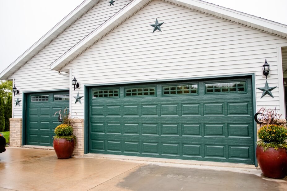 Emergency garage door repair service technician replacing hardware parts in Mount Vernon Ohio